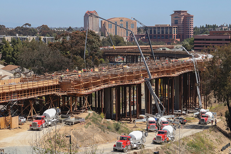 Crews place cement at the UC San Diego Central Campus Trolley Station. (May 2018)